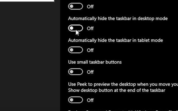 Check the "Automatically hide the taskber in desktop mode" option in settings.